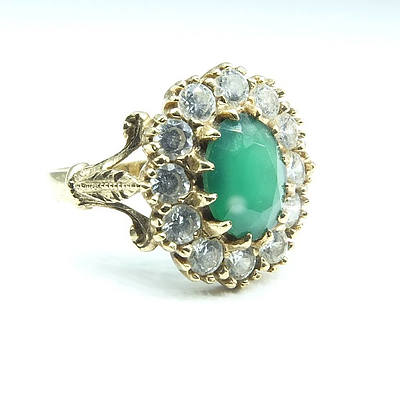 9ct Yellow Gold Oval Green Semi Precious Gem with Colourless Facetted Gems Around