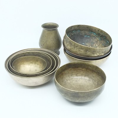 Group of Graduating Brass Bowls and a Vase