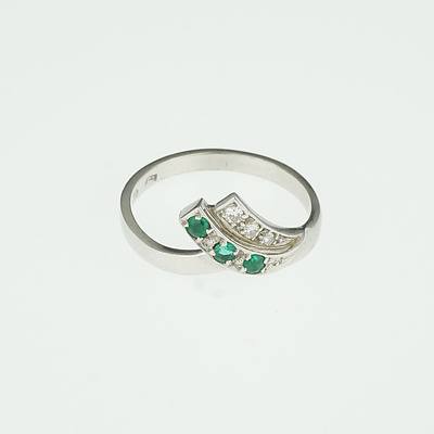 18ct White Gold Ring with Three Round Fine Grade Emeralds And Three Round Brilliant Cut Diamonds