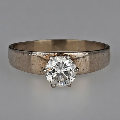 18ct White Gold Ring with Round Brilliant Cut Diamond in A High Six Claw Setting