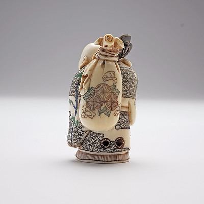 Japanese Carved and Stained Ivory Nestuke