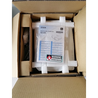 Group of Two DVD Players, VHS Player and Multimedia Projector