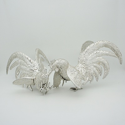 Two Cast Metal Roosters