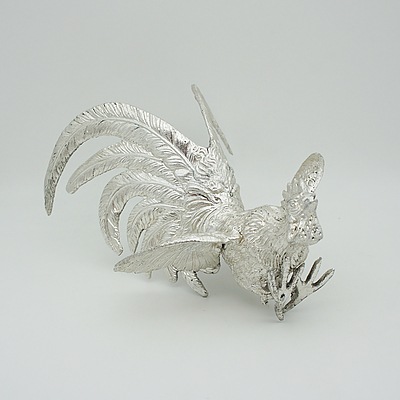 Two Cast Metal Roosters