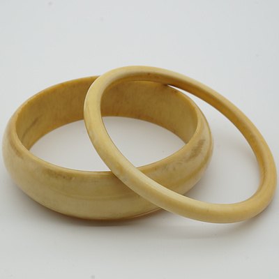 Two Carved African Ivory Bangles