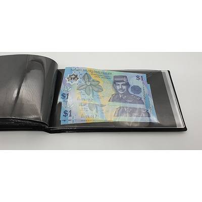 Booklet with Assorted Foreign Banknotes Including Fijian, American, Indonesian Notes and More