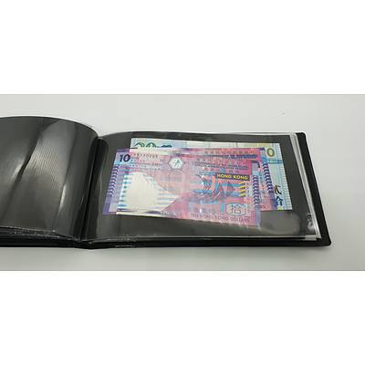 Booklet with Assorted Foreign Banknotes Including Fijian, American, Indonesian Notes and More