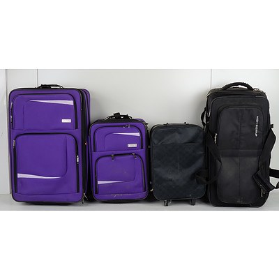 Group of Four Suitcases