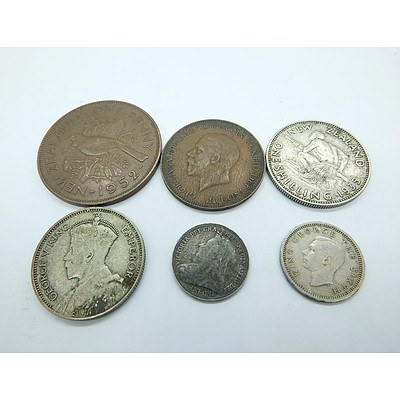Six Collectable New Zealand and United Kingdom Coins Including a 1934 One Shilling Coin