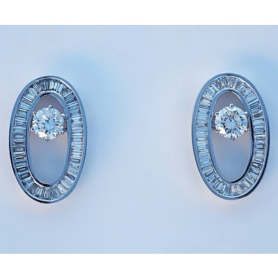 A Superb Pair of 18ct White Gold Diamond Stud Earrings with Removable Oval Frame of Baguette and Tapered Baguette Diamonds