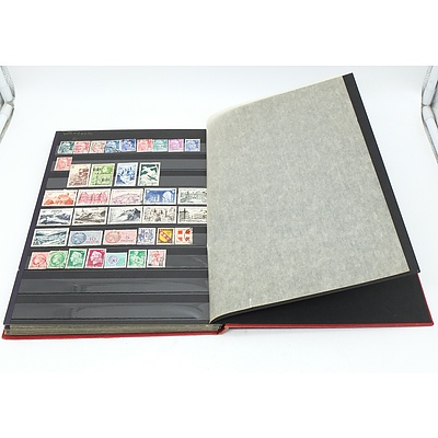 Three Stamp Albums With Stamps From Helvetia, Portugal, Romania, Uruguay, Australia and More