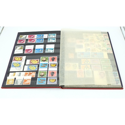 Three Stamp Albums With Stamps From Helvetia, Portugal, Romania, Uruguay, Australia and More