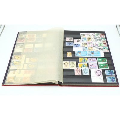 Three Stamp Albums With Stamps From Helvetia, Portugal, Romania, Uruguay, Australia and More