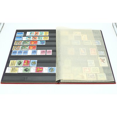 Three Stamp Albums With Stamps From Helvetia, Portugal, Romania, Uruguay, Australia and More