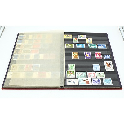 Three Stamp Albums With Stamps From Helvetia, Portugal, Romania, Uruguay, Australia and More