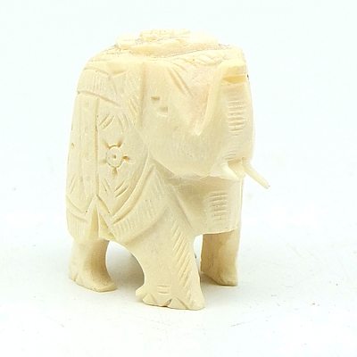 Group of Carved Ebony Elephants and Another Small Ivory Elephant