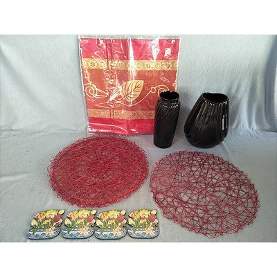 Assorted homewares including vases, placemats, cushion cover and coasters