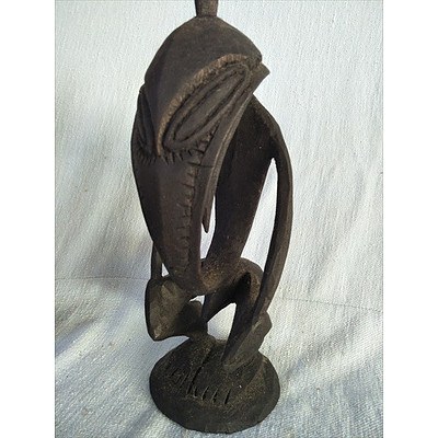 Assorted Oriental ornaments including wooden sculpture