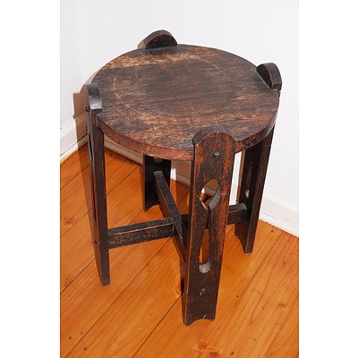 A Small Oak Arts and Crafts Period Plant Stand with Pierced Supports