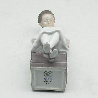 Bing Grondahl and Porcelain Ceramic Figure of a Girl Knitting