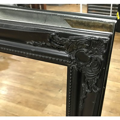 Two Framed Wall Mirrors