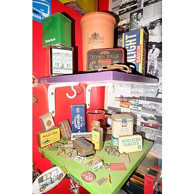 Two Shelves of Various Tins, Advertising Boxes, Badges and More
