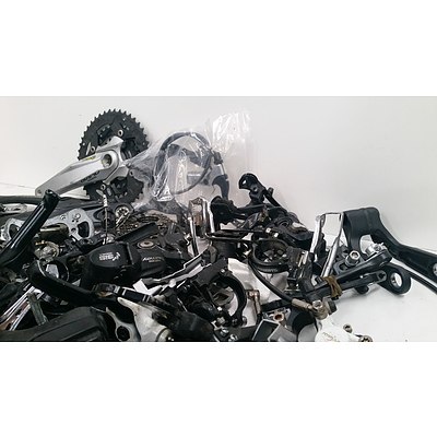 Assorted Boxes Of Bike Accesories Including Cranks, Brakes & More.