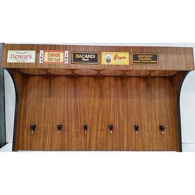Wall Mount Spirit Dispensing Cabinet and Framed Carlton Beer Poster