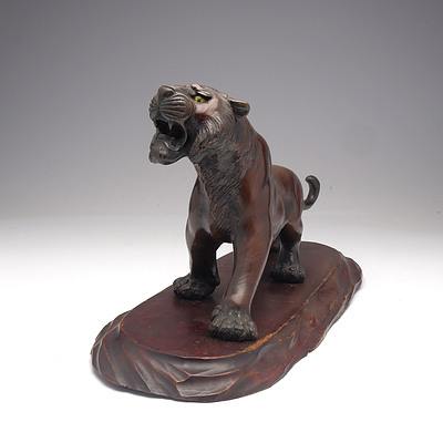 Japanese Patinated Bronze Model of a Stalking Tiger on a Carved Wood Base, Meiji Period 1868-1912
