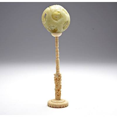 Antique Chinese Carved Serpentine Puzzle Ball on Ivory Stand