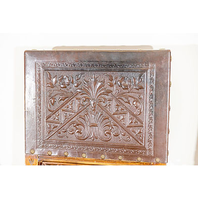 Six Late Victorian Walnut and Embossed Leather Dining Chairs with Tudor and Gothic Influence