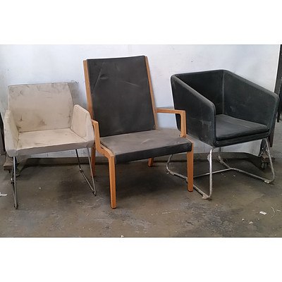 Three Leather Upholstered Armchairs