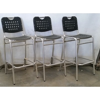 Seven Black and Chrome Bar Chairs
