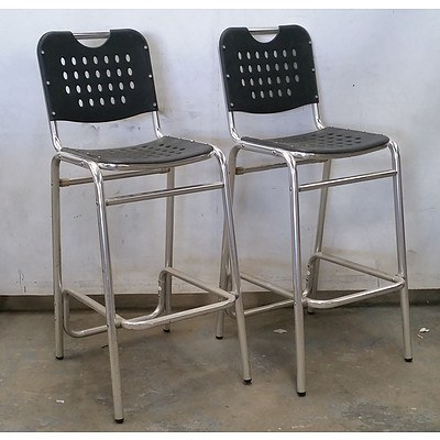 Seven Black and Chrome Bar Chairs