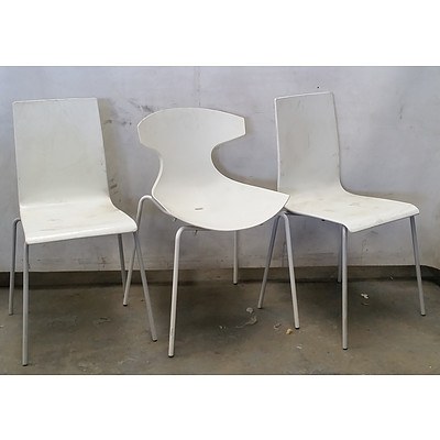 Group of Various White Chairs