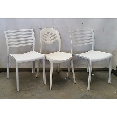 Group of Various White Chairs