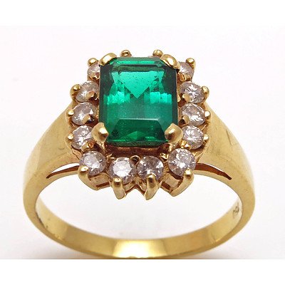 18ct Gold Synthetic Emerald & Diamond Halo Ring