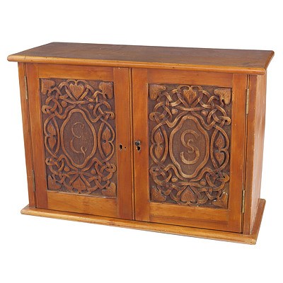 Australian Arts and Crafts Carved Kauri Pine Cupboard, Early 20th Century