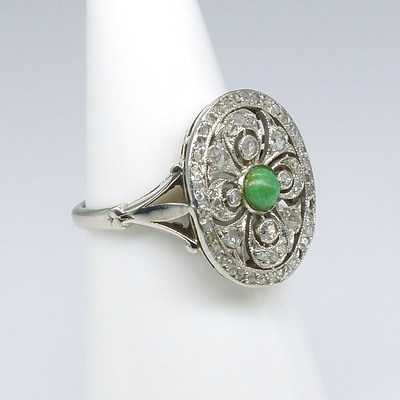 Art Deco 18ct White Gold and Platinum Ring with Oval Plate Pierced in Floral Design with Parve Set Rose Cut Diamonds and Bezel Set Old Mine Cut Diamond with Turquoise Centre Circa 1900