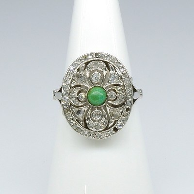 Art Deco 18ct White Gold and Platinum Ring with Oval Plate Pierced in Floral Design with Parve Set Rose Cut Diamonds and Bezel Set Old Mine Cut Diamond with Turquoise Centre Circa 1900