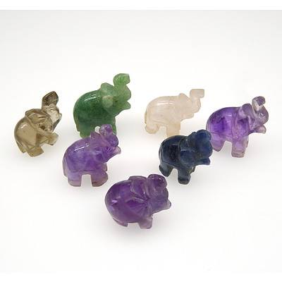 Seven Carved Amethyst, Smoky Quartz, Rose Quartz, Aventurine Quartz and Lapis Elephants