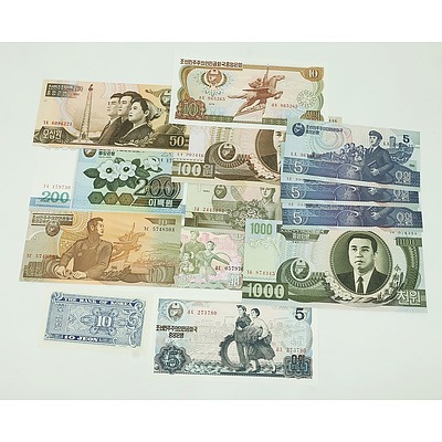 Group of North Korean Banknotes, Including 2002 100 Won, 2005 200 Won