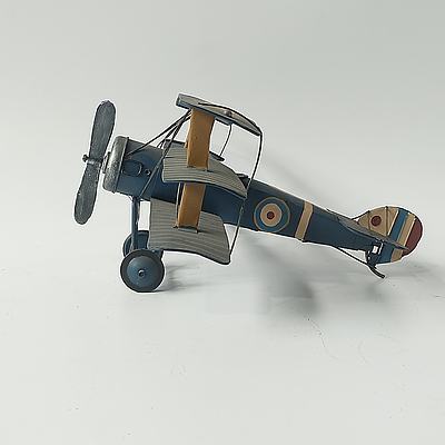 A Tin Model of a Tri Plane and A Metal Model of a Market Bicycle