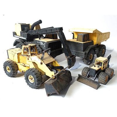 Four Metal Tonka Toys