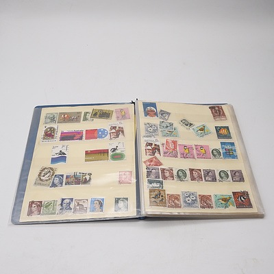 Four Stamp Albums with Various Australian and International Stamps, Including Australian King George V 2d Red, Colombo Plan 1951, Montreal 1976 Olympics and More