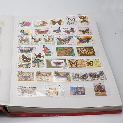 Four Stamp Albums with Various Australian and International Stamps, Australian First Day Covers, and Australia Post Stamp Sets