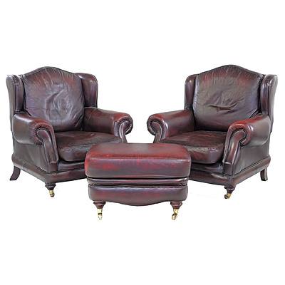 Pair of British Made Thomas Lloyd Red Leather 'Consort' Wingback Armchairs and Matching Ottoman