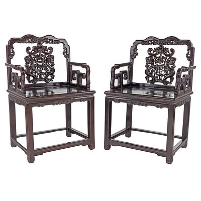 Pair of Antique Chinese Stained Hardwood Armchairs Carved with Bats and Shou Symbols with Companion Side Table