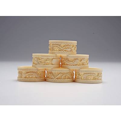 Boxed Set of Six Chinese Carved and Pierced Elephant Ivory Serviette Rings