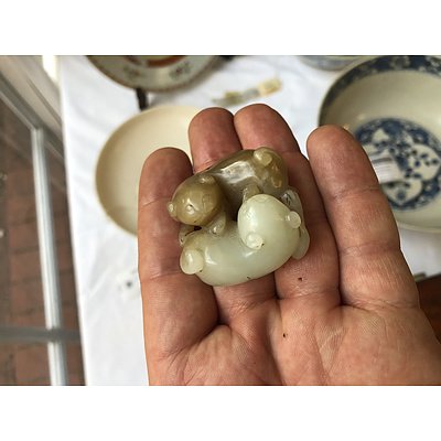 Chinese Carved Two Tone Mutton Fat and Light Brown Jade Intertwined Cats on Carved Hardwood Stand, Late Qing